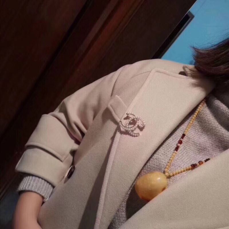 Ch*el brooches